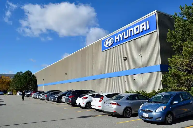 Hyundai showroom with cars on display showing global sales models for 2026