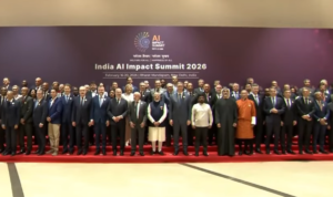 PM Narendra Modi and guests at India AI Summit 2026 taking part in AI safety pledge