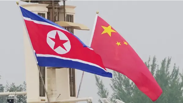 Flags of China and North Korea